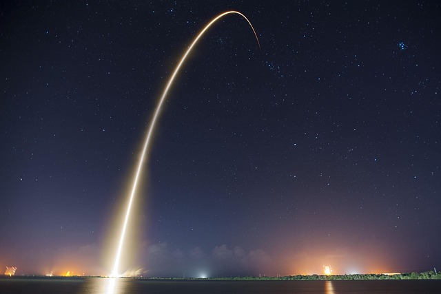 spacecraft rocket launch pad night